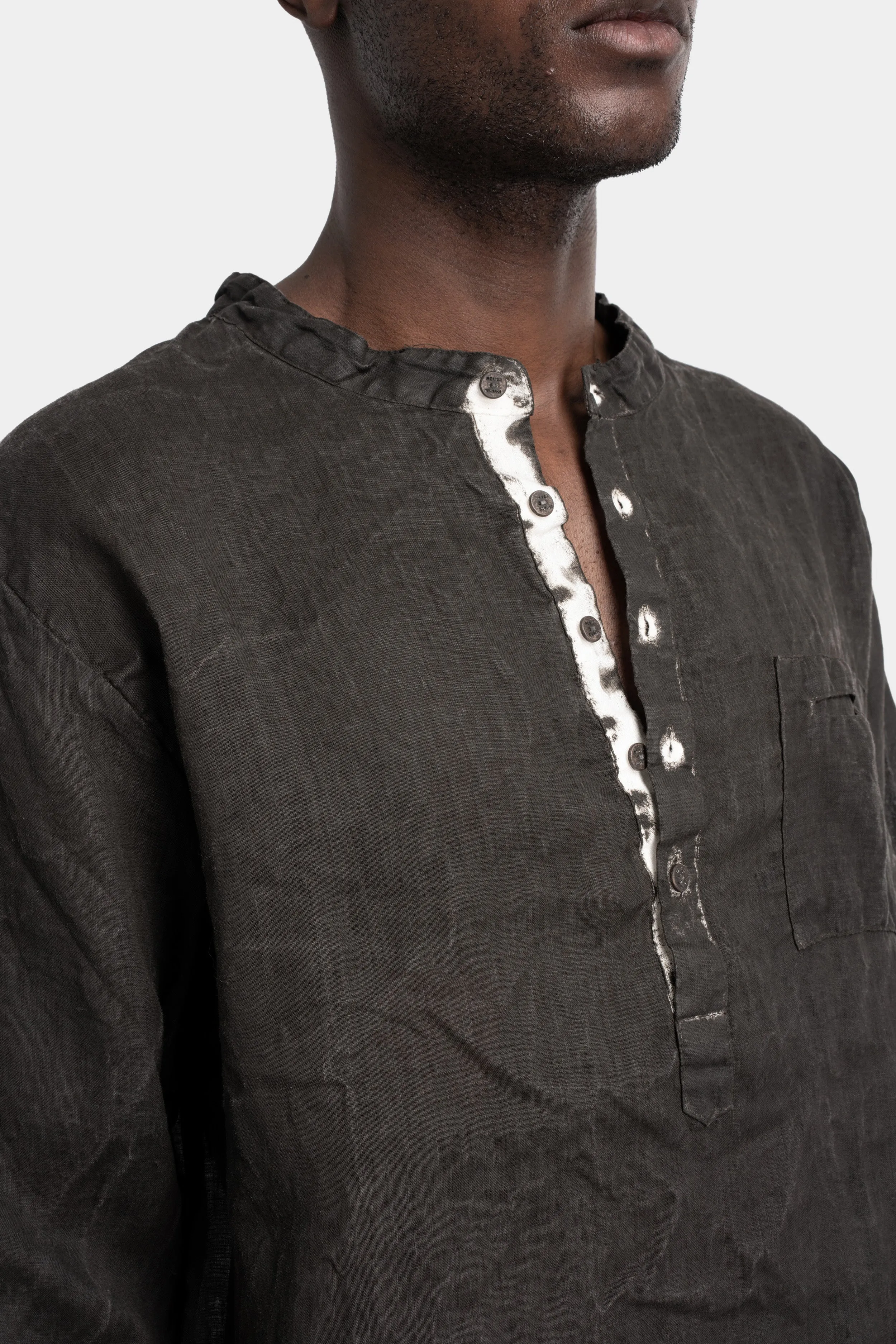 Collarless half buttoned up shirt