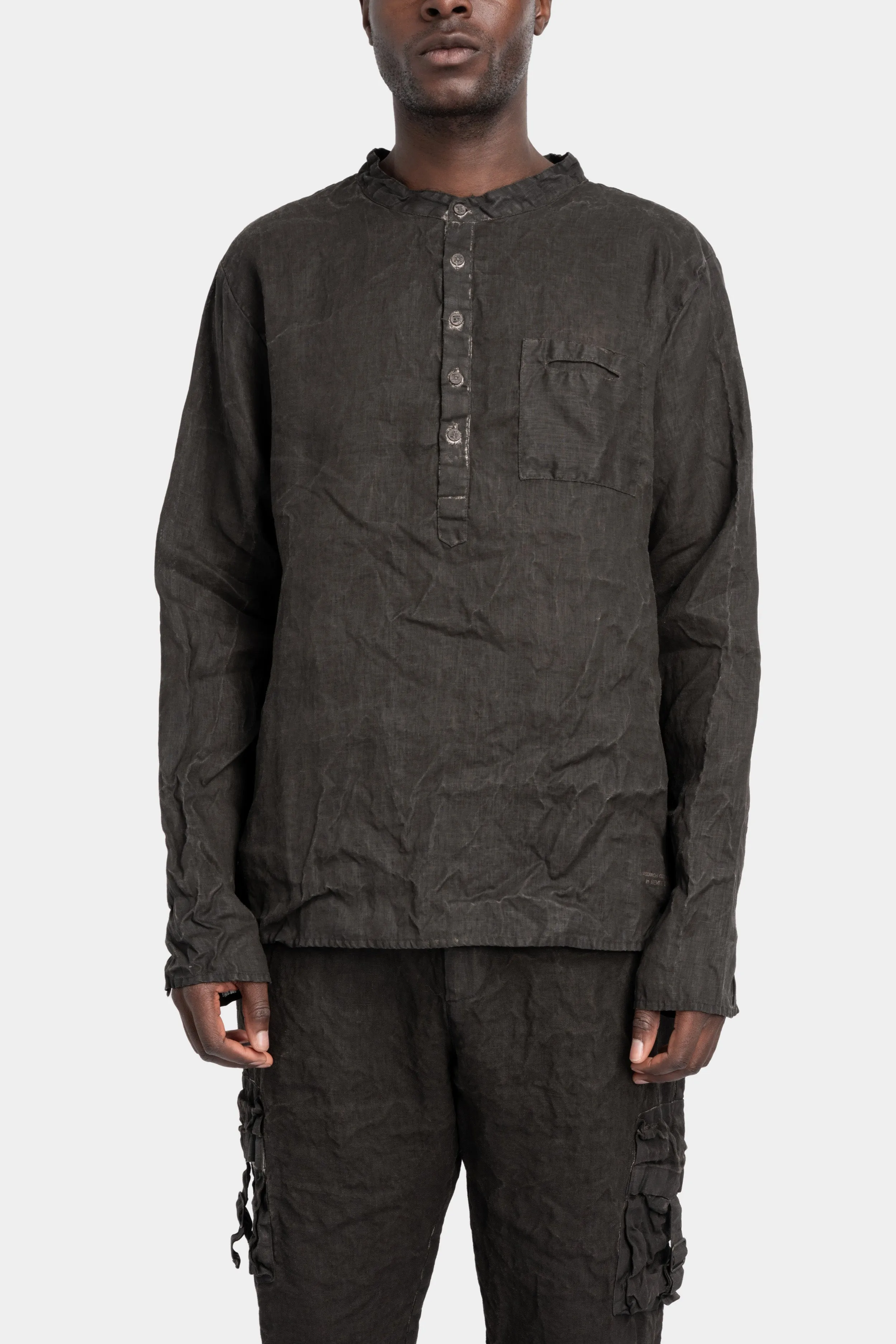 Collarless half buttoned up shirt