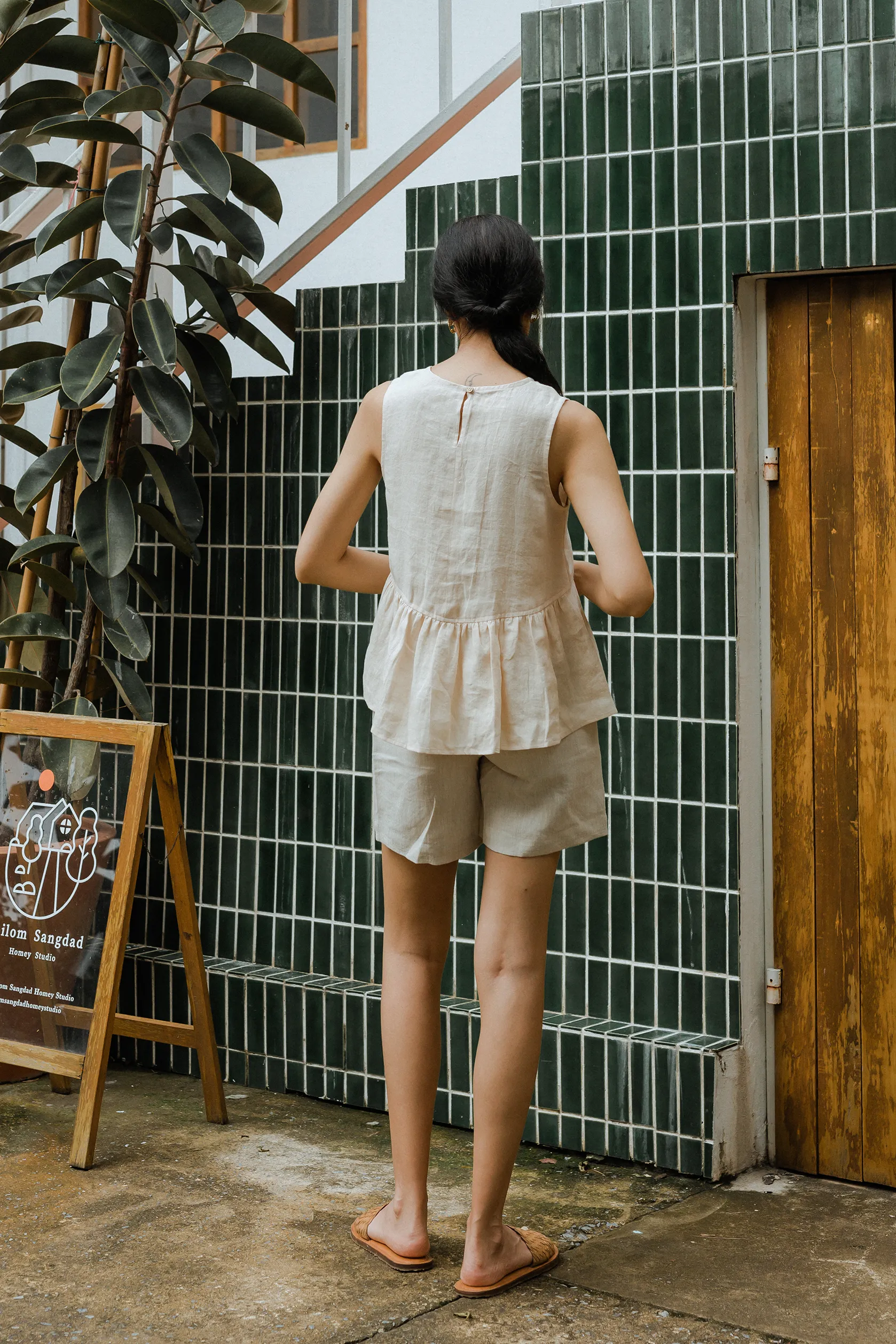 Sleeveless Peplum Top
